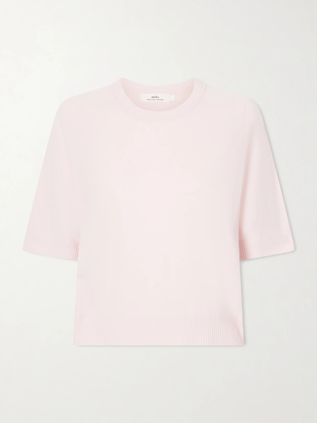 Image of a model wearing Outerwear. Product name - Kai Cashmere Sweater in Pastel pink colour by brand - Arch4