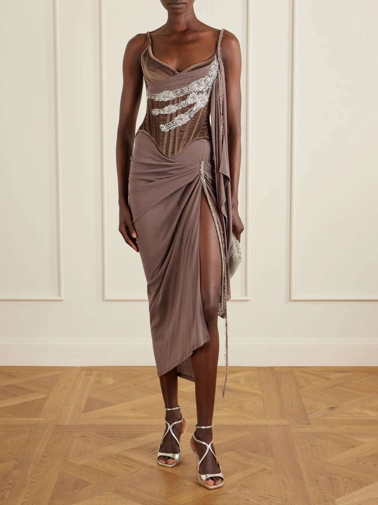 Image of a model wearing Tops. Product name - Tie-detailed Embellished Cotton-blend Velvet Corset Top in Brown colour by brand - Wiederhoeft