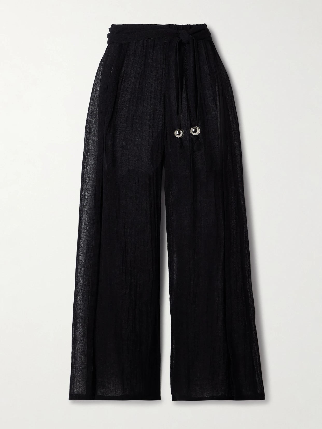 Image of a model wearing Pants. Product name - Embellished Belted Crinkled Linen-blend Gauze Wide-leg Pants in Black colour by brand - Lisa Marie Fernandez