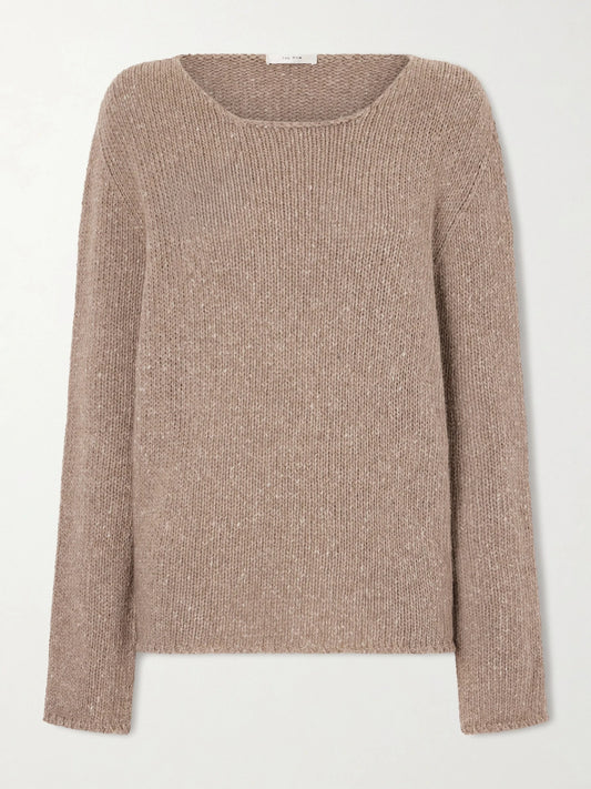 Image of a model wearing Outerwear. Product name - Nitha Cashmere Sweater in Cream colour by brand - The Row