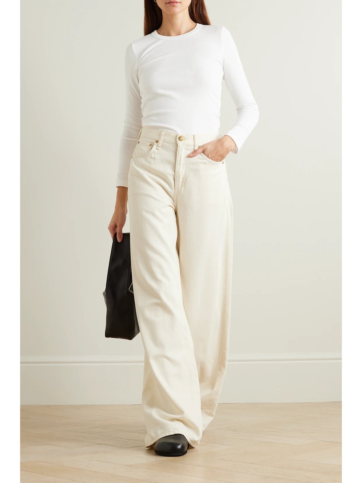 Image of a model wearing Tops. Product name - Kelly Ribbed Stretch-cotton Jersey Top in White colour by brand - LESET
