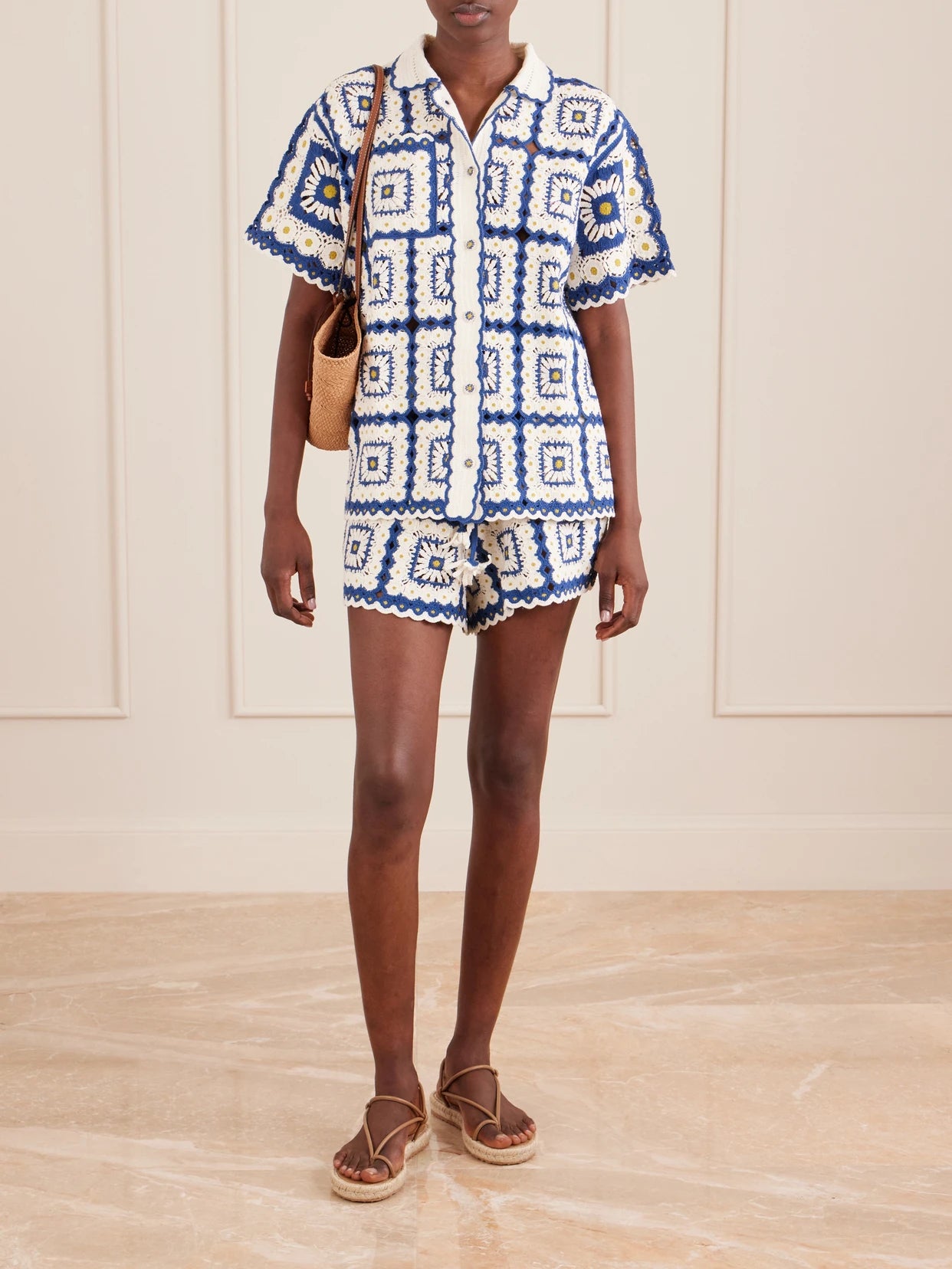 Image of a model wearing Tops. Product name - Dolly Crochet Cotton Shirt in Blue colour by brand - ALÉMAIS