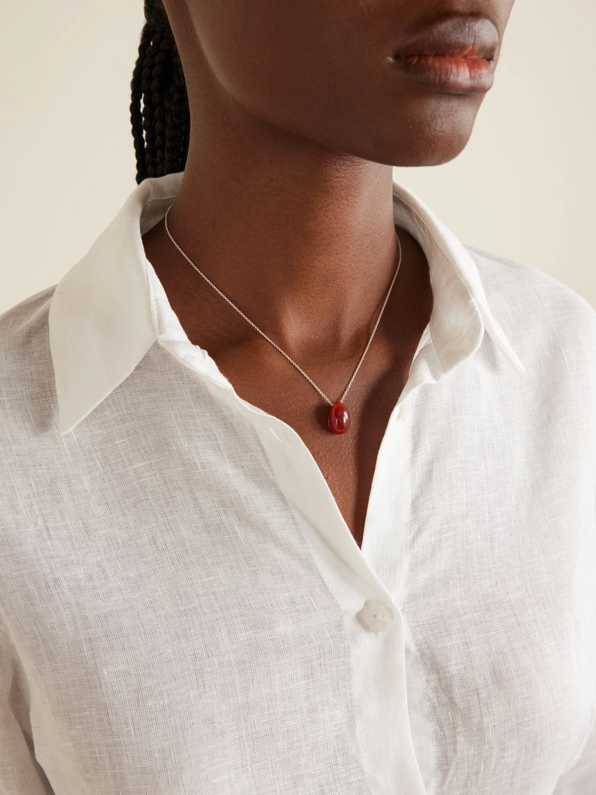 Image of Necklaces. Product name - Tiny Egg Silver And Carnelian Pendant in Red colour by brand - Sophie Buhai