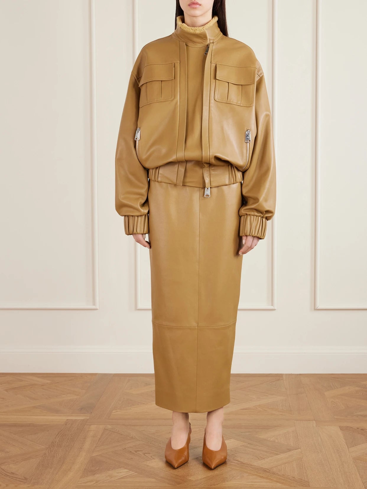 Image of Coats & Jackets. Product name - Malone Shearling Bomber Jacket in Beige colour by brand - KHAITE