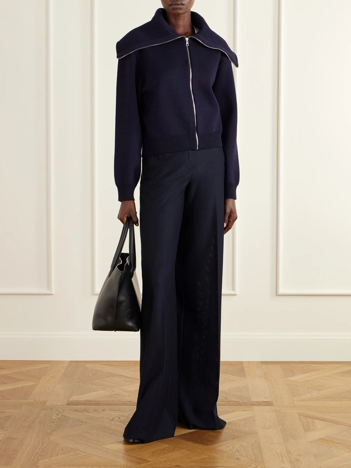 Image of a model wearing Outerwear. Product name - Wool-blend Zip-up Cardigan in Navy colour by brand - RÓHE