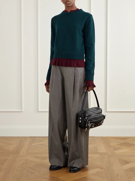 Image of a model wearing Outerwear. Product name - Layered Wool Sweater in Dark green colour by brand - Acne Studios