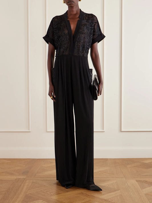 Image of Bodysuits. Product name - Geralyn Embroidered Velvet Jumpsuit in Black colour by brand - Norma Kamali
