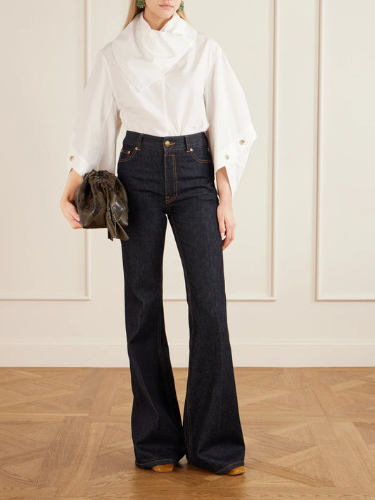 Image of a model wearing Tops. Product name - Valiant Utility Cotton-poplin Shirt in Ivory colour by brand - Zimmermann