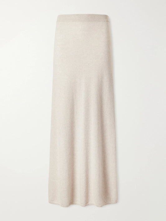 Image of a model wearing Skirts. Product name - Dolly Cashmere Midi Skirt in Cream colour by brand - LISA YANG