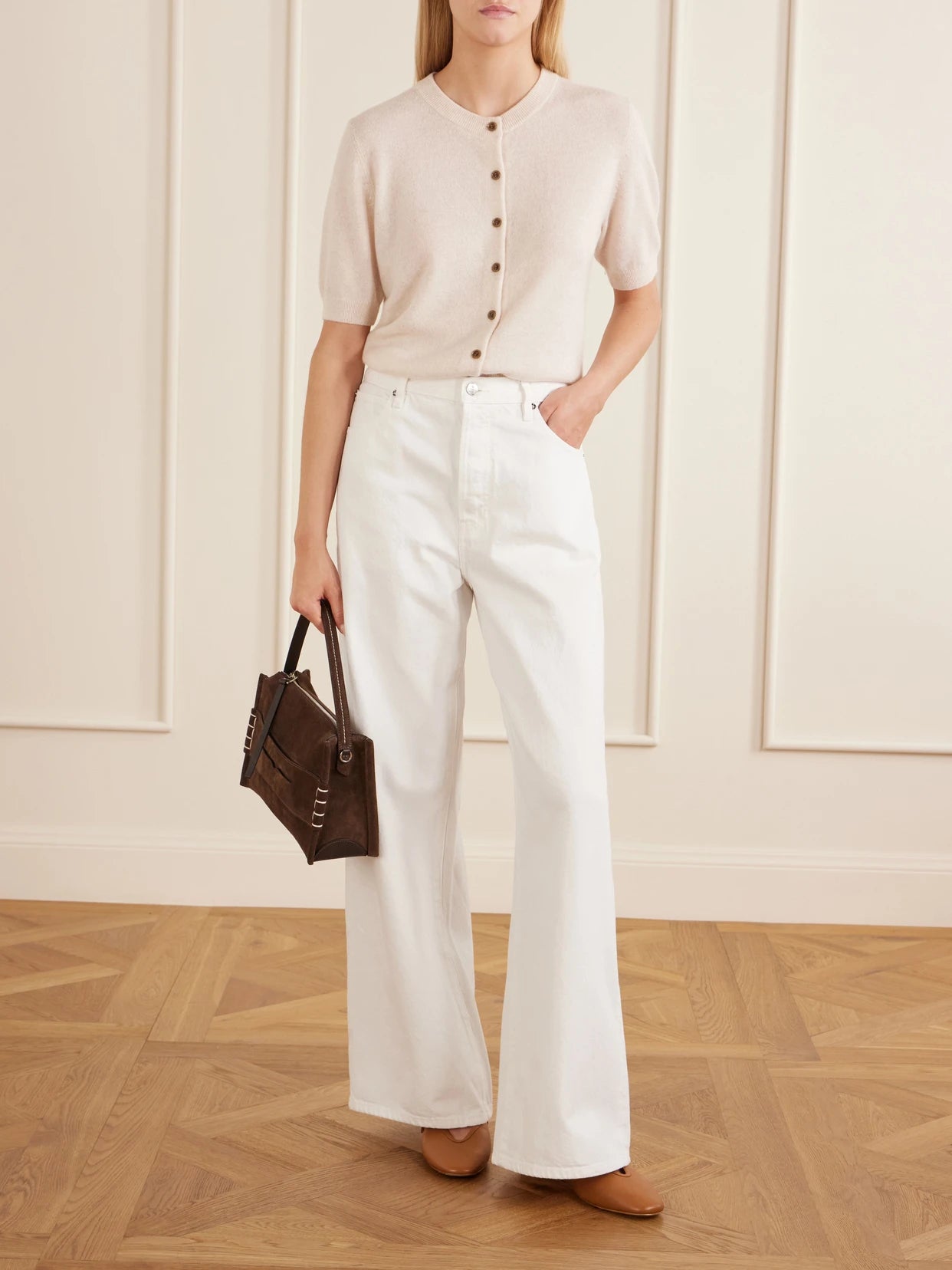 Image of a model wearing Outerwear. Product name - Marene Cashmere Knit Cardigan in Cream colour by brand - LISA YANG