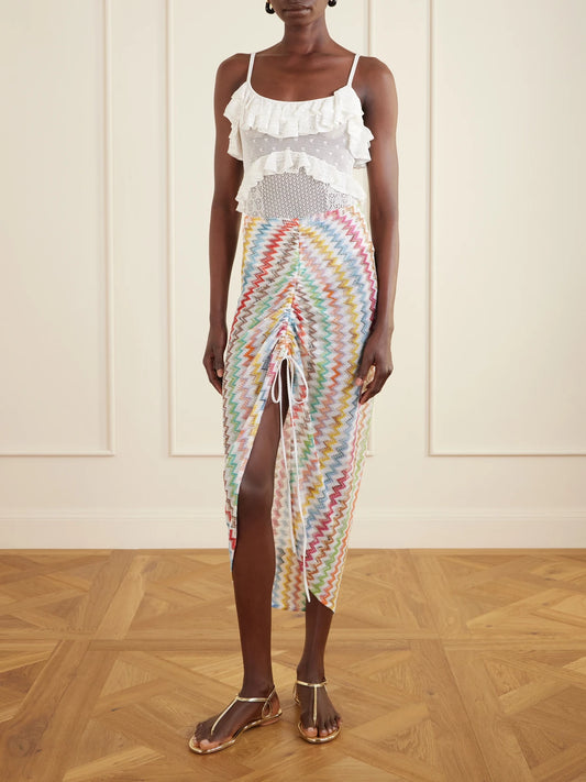 Image of a model wearing Skirts. Product name - Gathered Striped Metallic Crochet-knit Midi Skirt in Blue colour by brand - Missoni