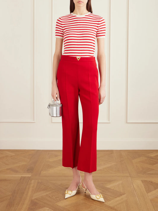 Image of a model wearing Tops. Product name - Embellished Striped Ribbed Cotton T-shirt in Red colour by brand - Valentino Garavani