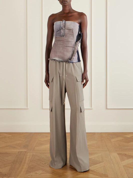 Image of a model wearing Tops. Product name - Frayed Denim Bustier Top in Blush colour by brand - Rick Owens