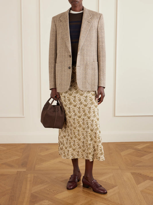 Image of a model wearing Outerwear. Product name - Winterdale Striped Wool And Cashmere-blend Sweater in Brown colour by brand - Loro Piana