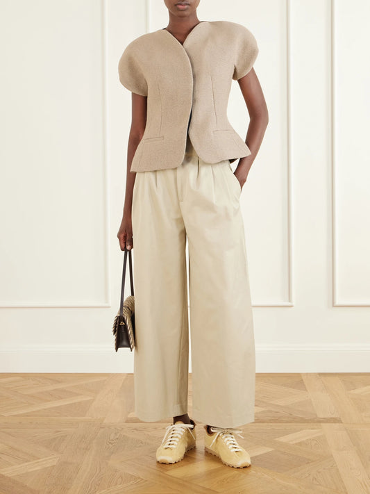 Image of Coats & Jackets. Product name - La Veste Oval Wool-blend Blazer in Beige colour by brand - Jacquemus