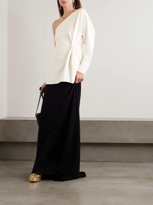 Image of a model wearing Tops. Product name - Asymmetric One-shoulder Silk-cady Top in Cream colour by brand - Valentino Garavani