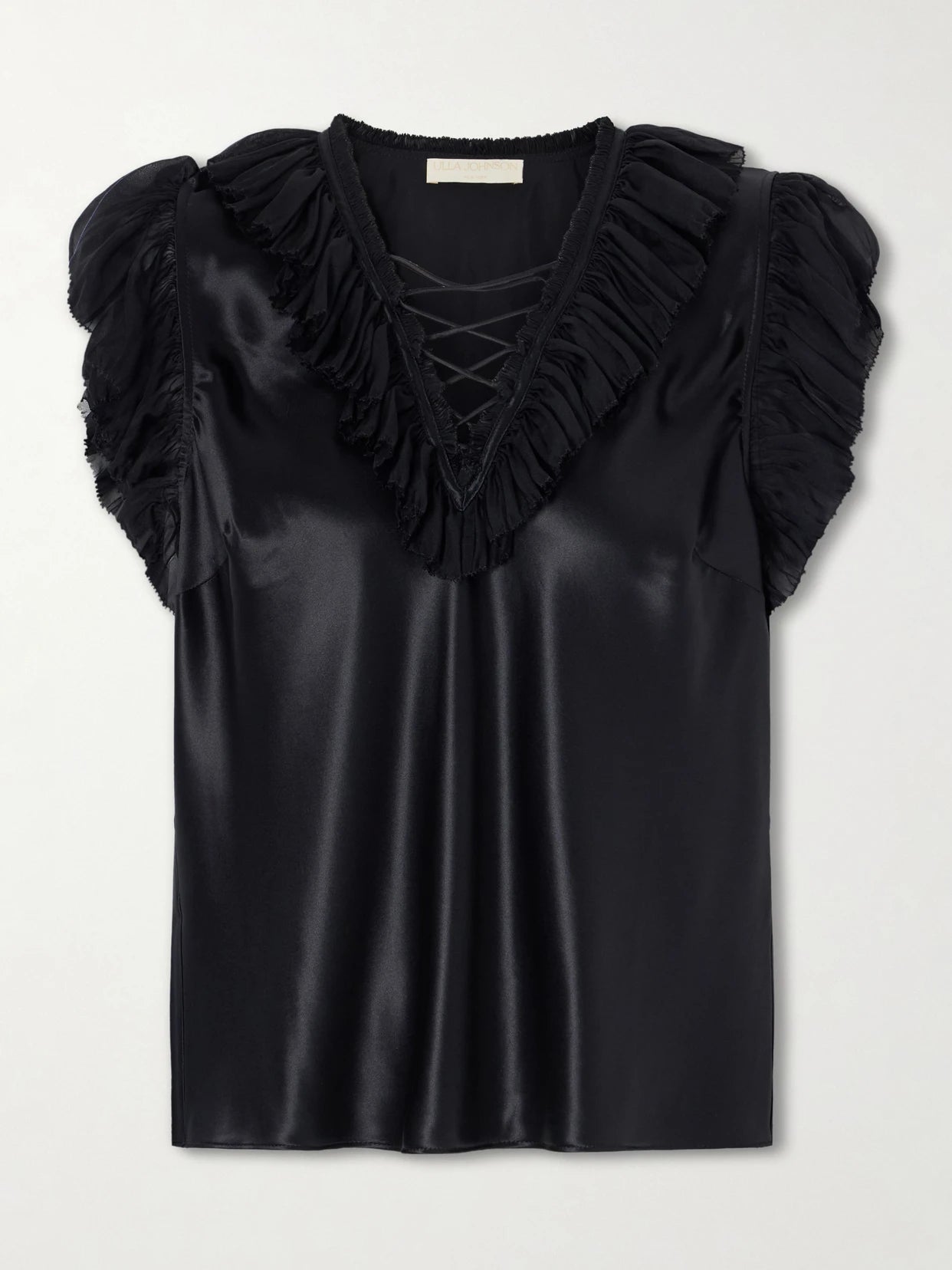 Image of a model wearing Tops. Product name - Ilyana Ruffled Silk Blouse in Black colour by brand - Ulla Johnson