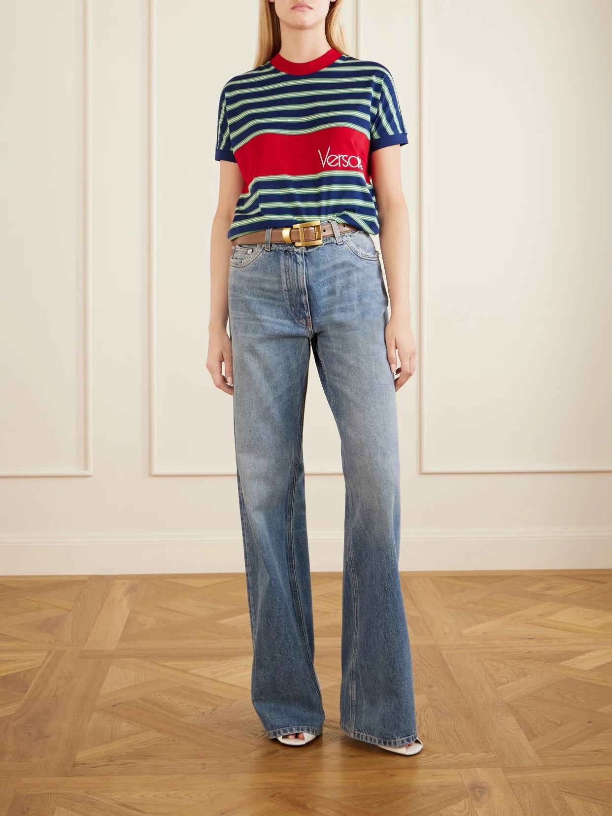 Image of a model wearing Tops. Product name - Logo-embroidered Striped Cotton-jersey T-shirt in Dark green colour by brand - Versace