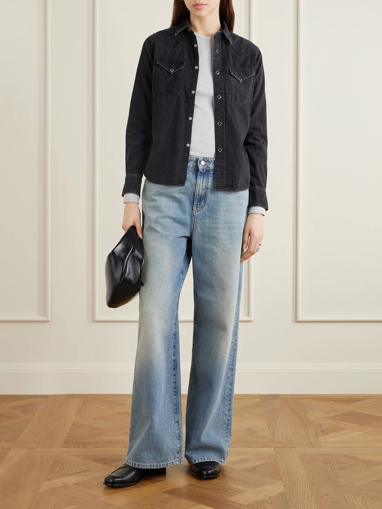Image of a model wearing Tops. Product name - Wrangler Embroidered Cotton Chambray Shirt in Black colour by brand - RRL