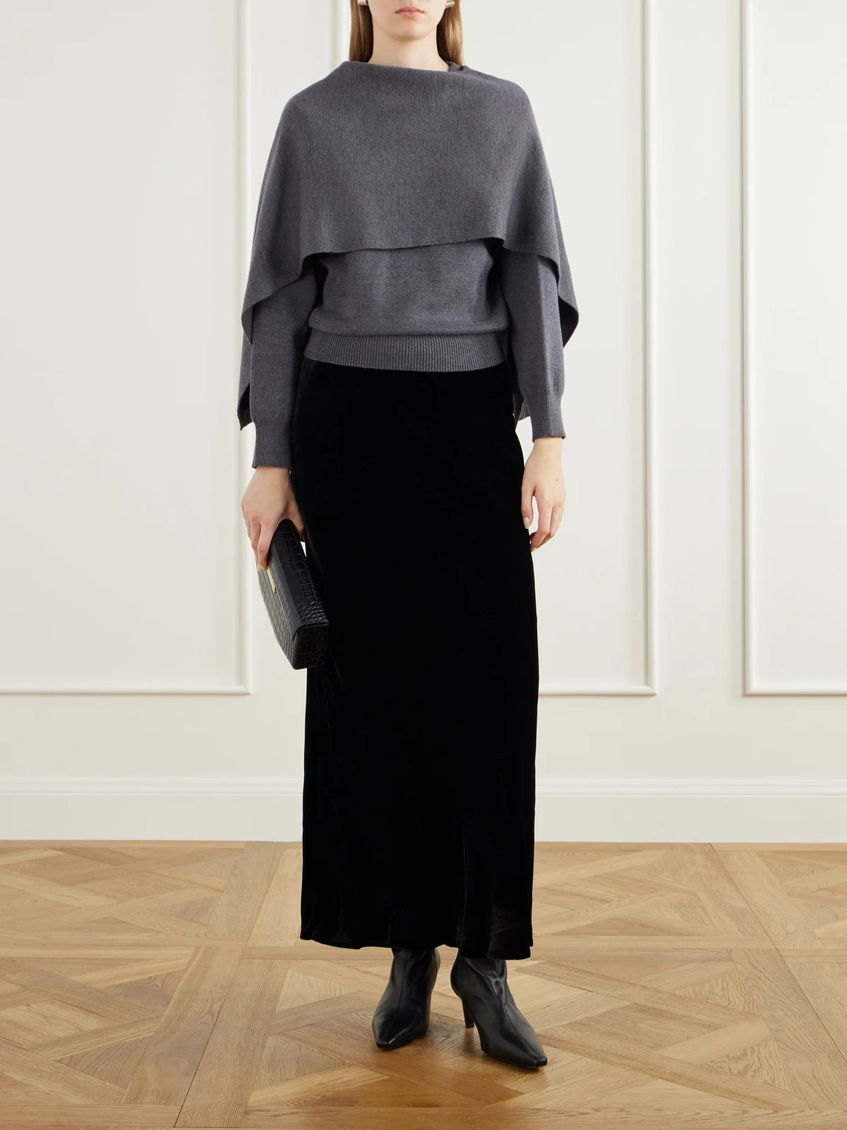 Image of a model wearing Outerwear. Product name - Layered Wool Sweater in Dark gray colour by brand - RÓHE