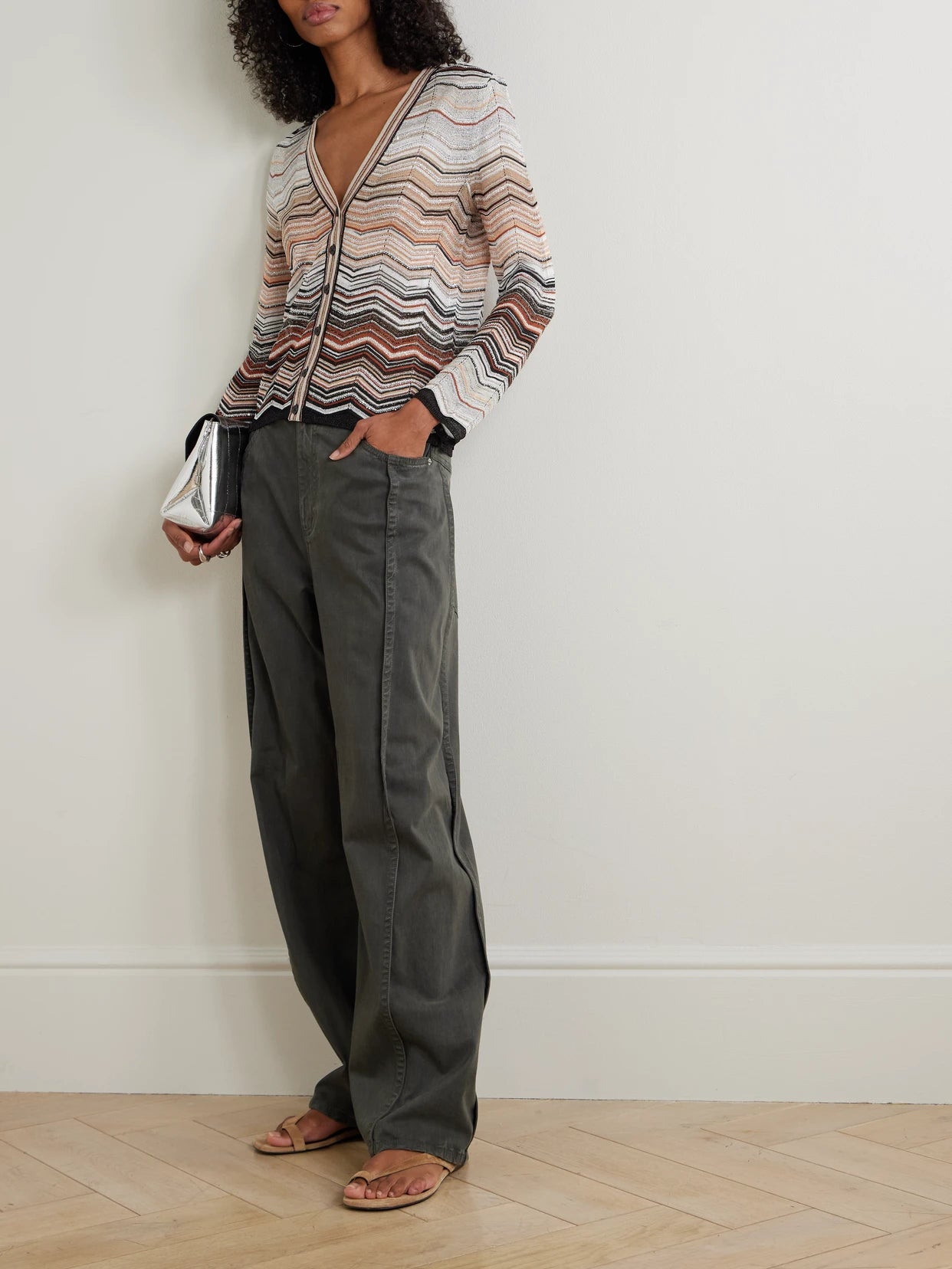 Image of a model wearing Outerwear. Product name - Sequin-embellished Striped Metallic Crochet-knit Cardigan in Multi colour by brand - Missoni