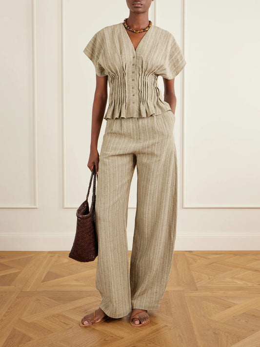 Image of a model wearing Tops. Product name - Camila Gathered Linen Top in Green colour by brand - Cortana