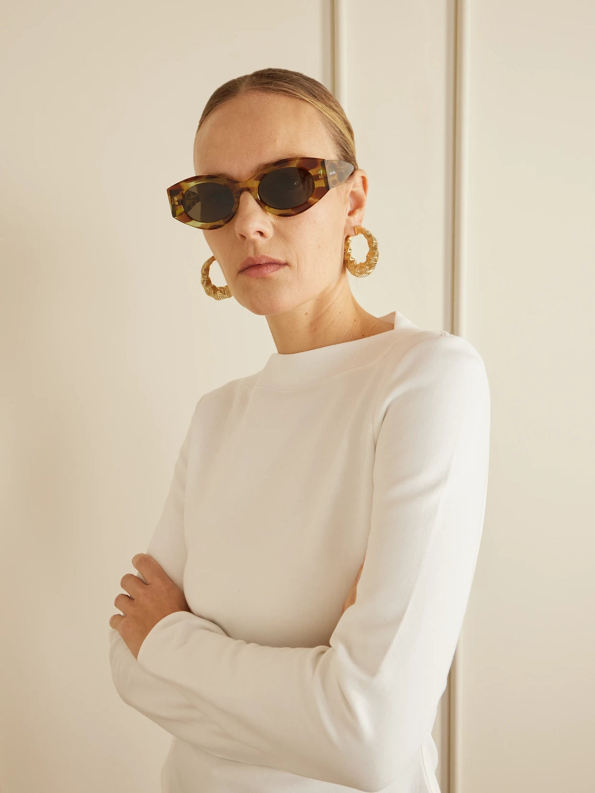 Image of Sunglasses. Product name - Lettering Round-frame Tortoiseshell Acetate Sunglasses in Yellow colour by brand - Alaïa