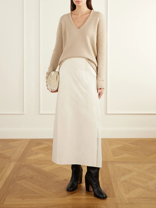 Image of a model wearing Outerwear. Product name - Alpaca And Cashmere-blend Sweater in Beige colour by brand - Lauren Manoogian