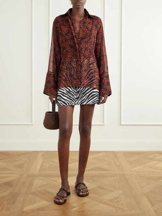 Image of a model wearing Tops. Product name - Floral-print Chiffon Shirt in Brown colour by brand - Cala de la Cruz