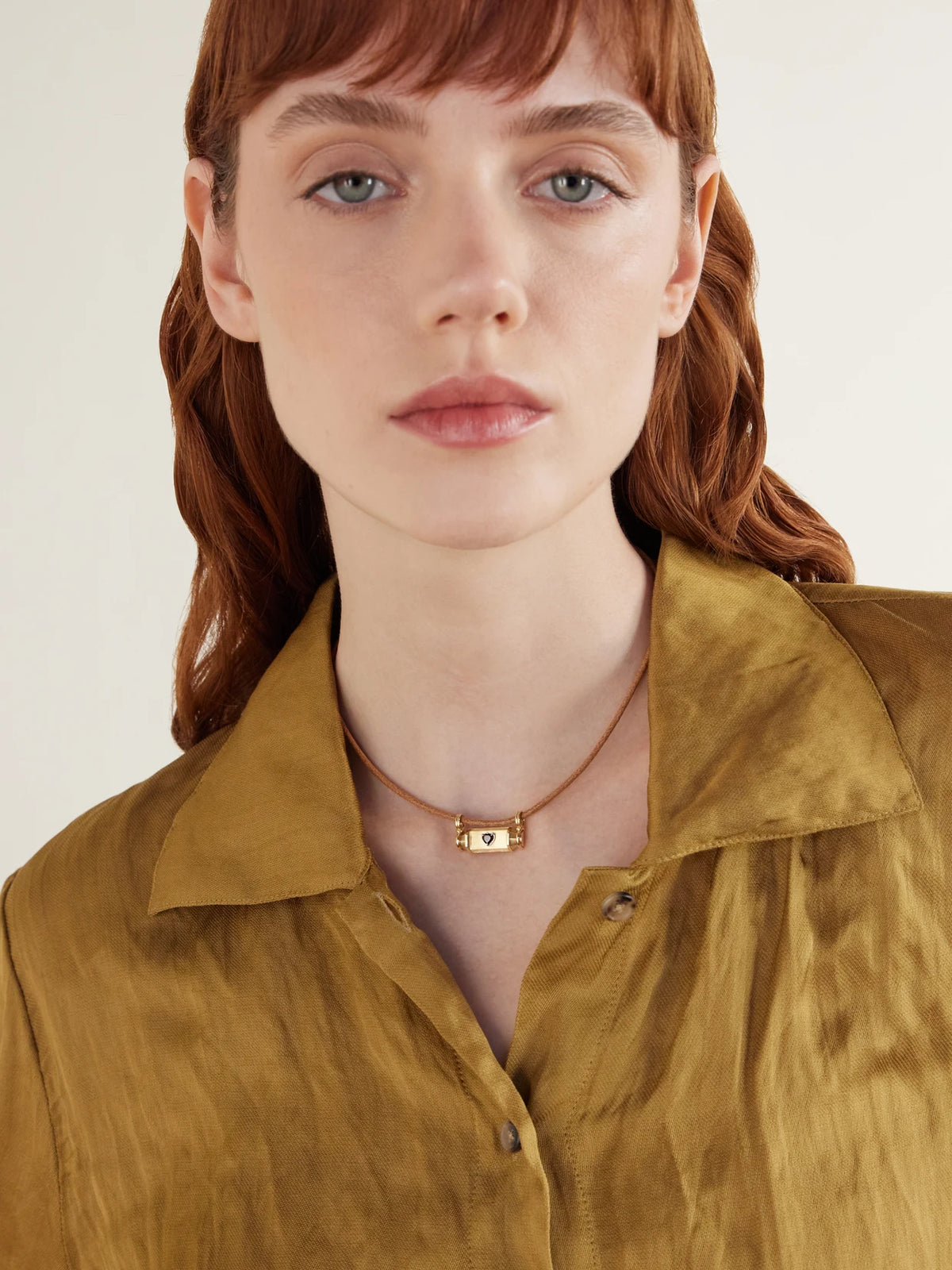 Image of Necklaces. Product name - Clover Smash Locket 18-karat Gold, Garnet And Leather Necklace in Multi colour by brand - Marie Lichtenberg