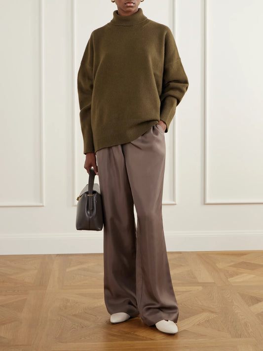 Image of a model wearing Outerwear. Product name - Wool-blend Turtleneck Sweater in Army green colour by brand - RÓHE