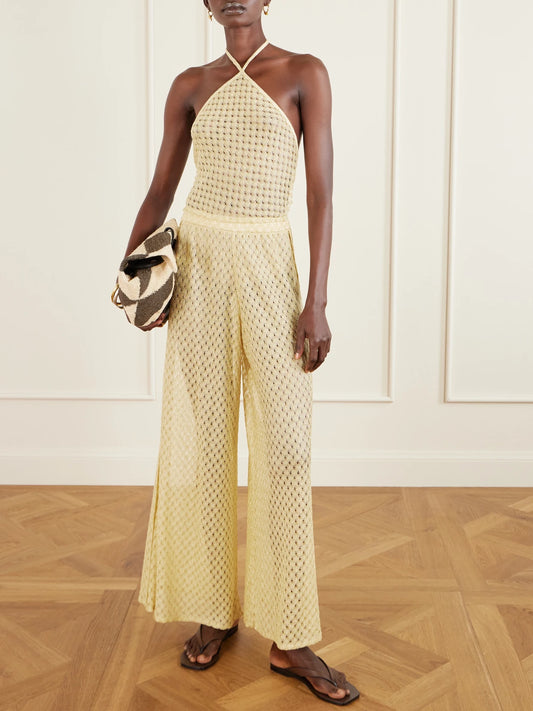 Image of a model wearing Pants. Product name - Mare Metallic Crochet-knit Wide-leg Pants in Gold colour by brand - Missoni
