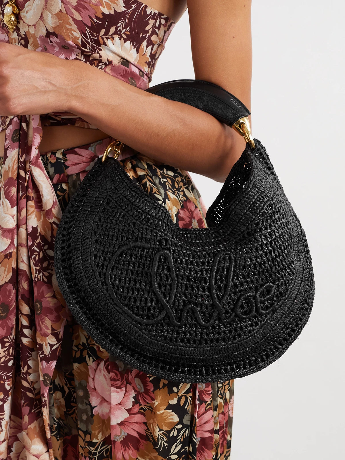 Image of Bags. Product name - Summer Banana Leather-trimmed Embroidered Raffia Tote in Black colour by brand - Chloé