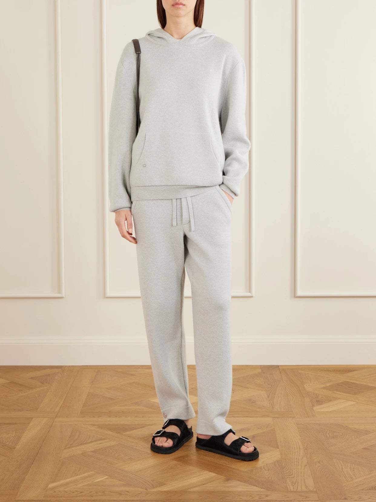 Image of a model wearing Outerwear. Product name - Cashmere Hoodie in Light gray colour by brand - God's True Cashmere