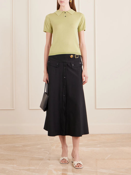 Image of a model wearing Outerwear. Product name - Daughter Jersey Polo Shirt in Green colour by brand - Still Here
