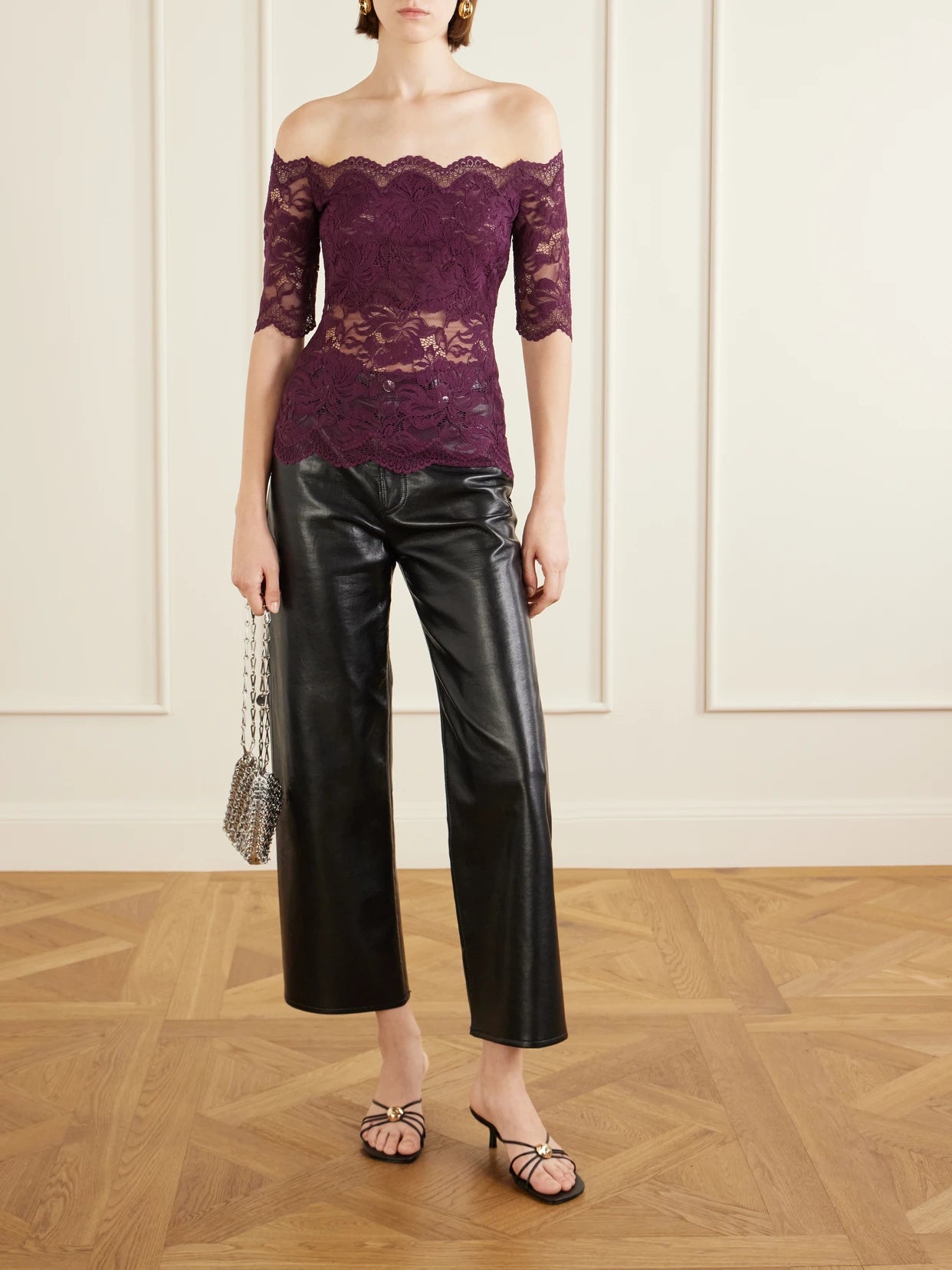 Image of a model wearing Tops. Product name - Off-the-shoulder Lace Blouse in Burgundy colour by brand - RABANNE