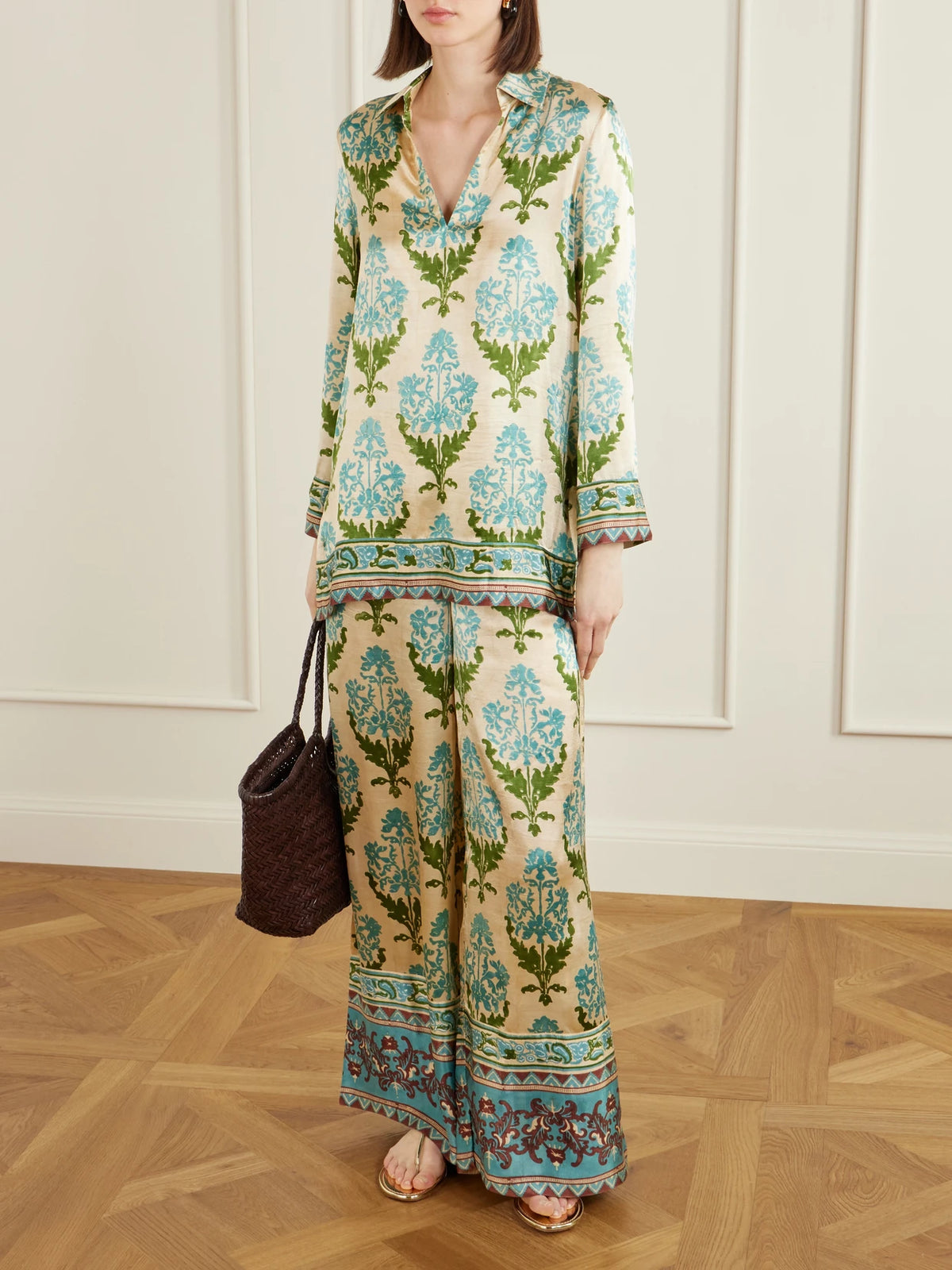 Image of a model wearing Tops. Product name - Jila Three Floral-print Silk-satin Shirt in Green colour by brand - Emporio Sirenuse