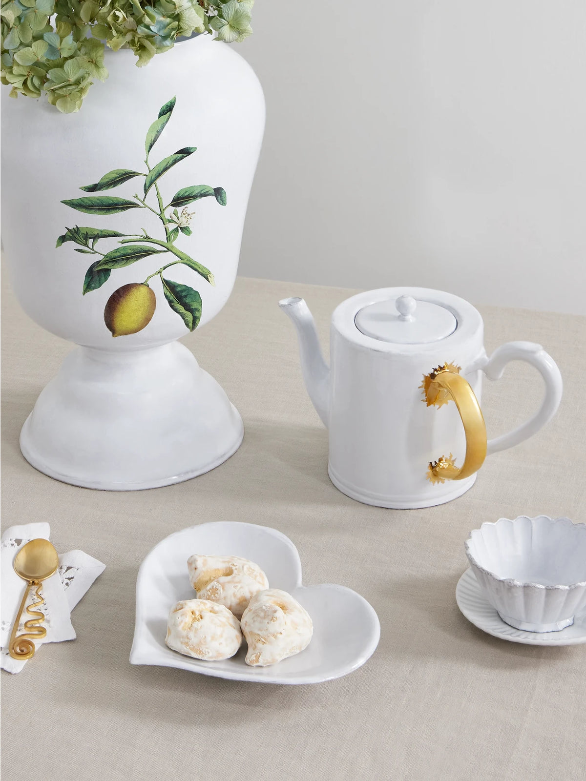 Image of Tableware. Product name - Coeur Ceramic Dessert Plate in White colour by brand - Astier De Villatte