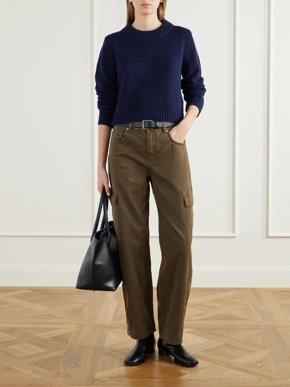 Image of a model wearing Outerwear. Product name - Mini Marin Cropped Ribbed Wool And Cashmere-blend Sweater in Navy colour by brand - La Ligne