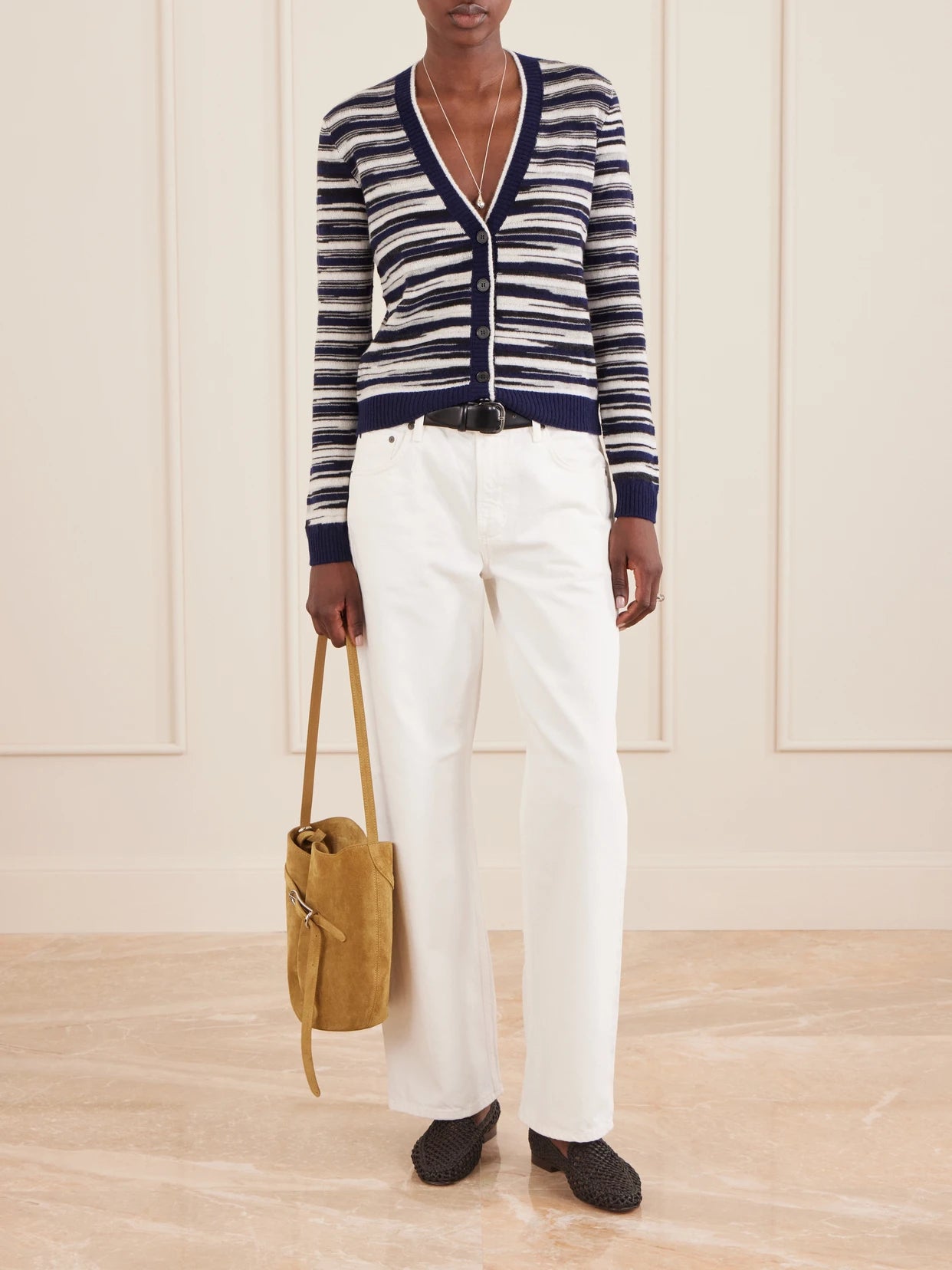 Image of a model wearing Outerwear. Product name - Striped Cashmere And Wool-blend Cardigan in Black colour by brand - Missoni