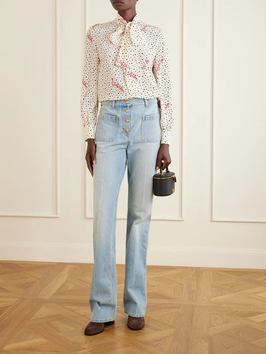 Image of a model wearing Tops. Product name - Pussy-bow Polka-dot Silk Crepe De Chine Blouse in Cream colour by brand - Valentino Garavani