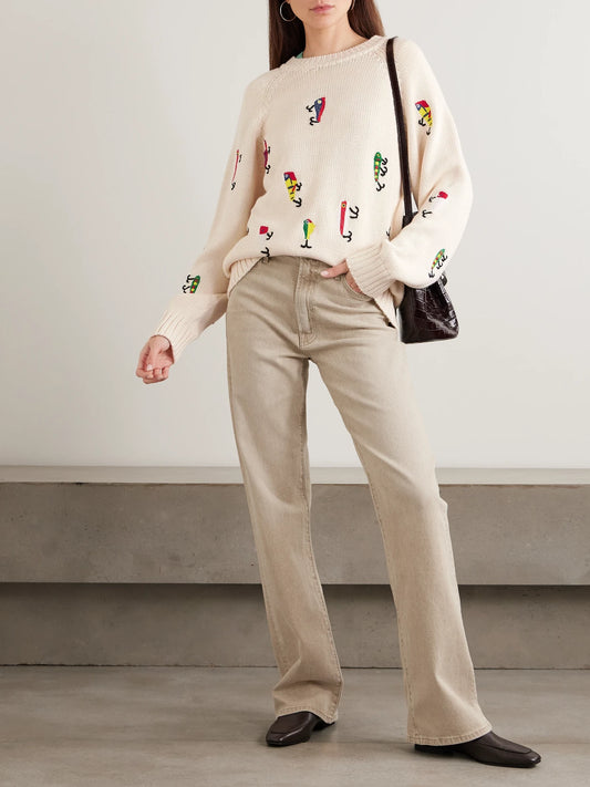 Image of a model wearing Outerwear. Product name - The Raglan Embroidered Cotton Sweater in Unknown colour by brand - Mother