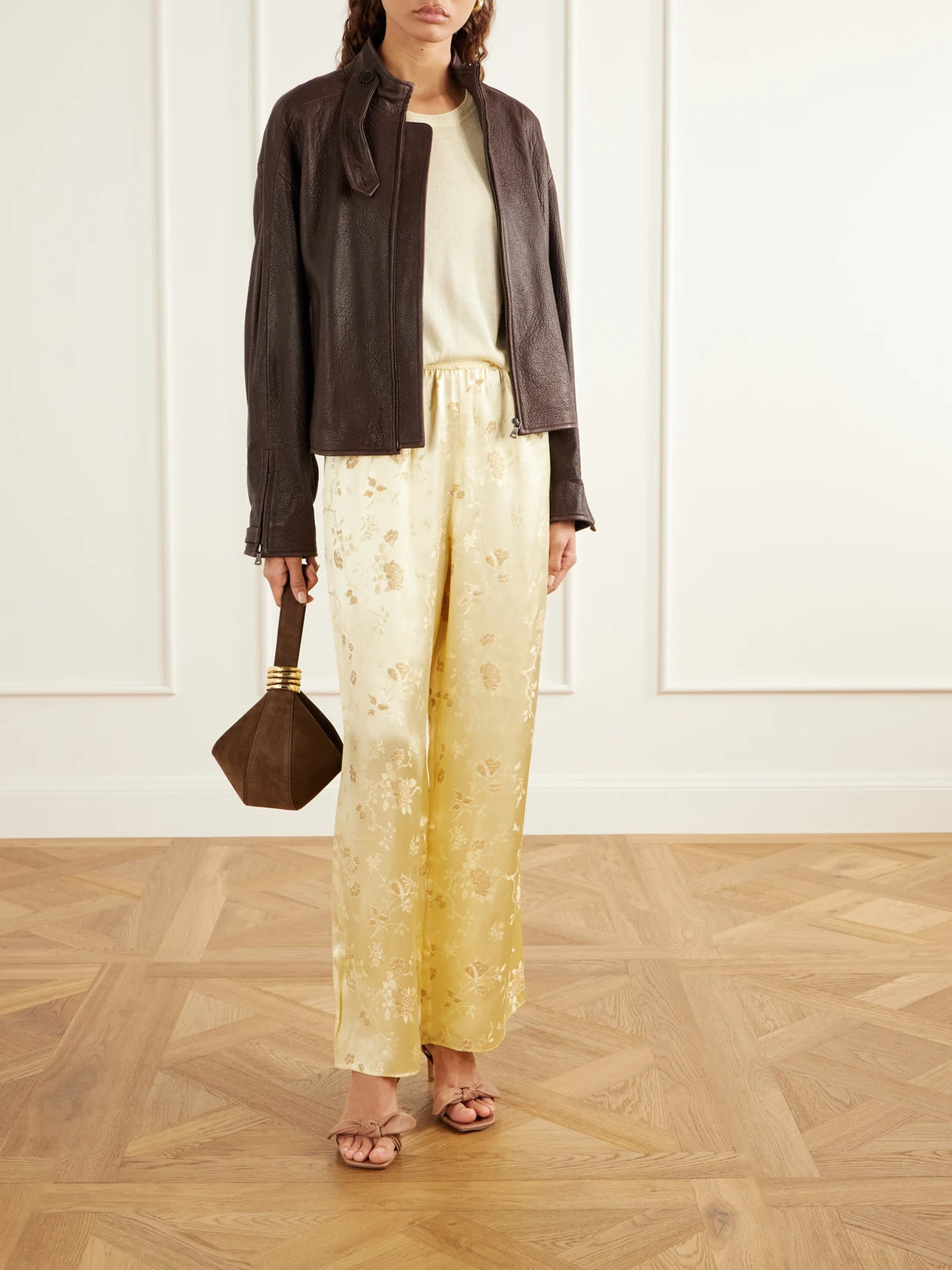 Image of a model wearing Pants. Product name - Lavona Silk-jacquard Wide-leg Pants in Pastel yellow colour by brand - DÔEN