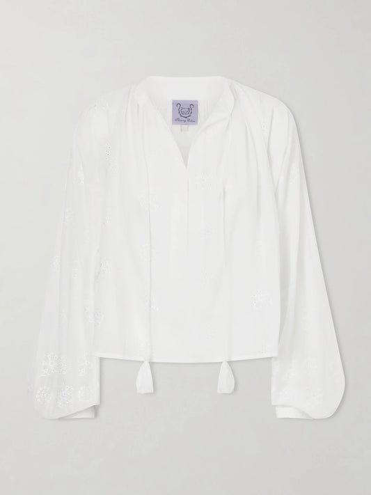 Image of a model wearing Tops. Product name - Guise Embroidered Cotton Blouse in Off-white colour by brand - Thierry Colson