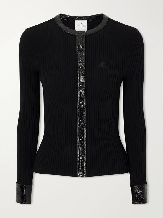 Image of a model wearing Outerwear. Product name - Logo-embroidered Ribbed-knit Cardigan in Black colour by brand - COURREGES