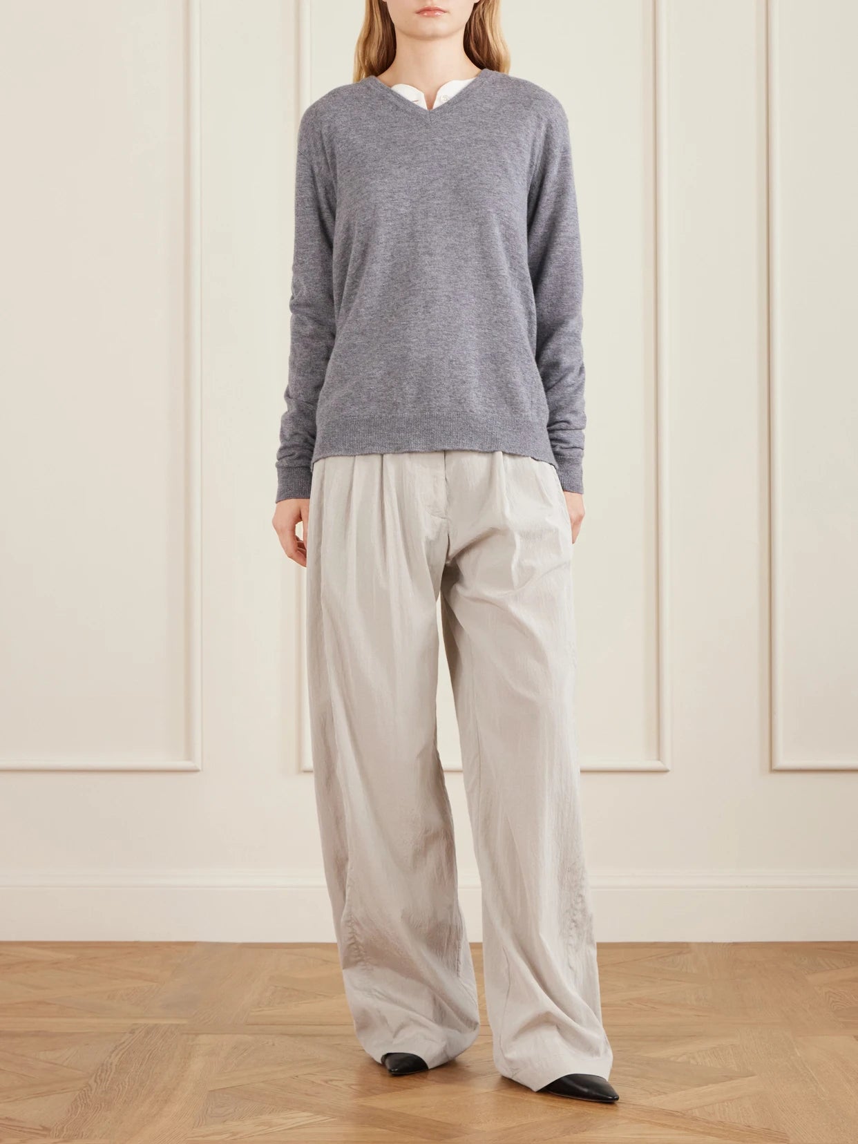 Image of a model wearing Outerwear. Product name - Nian Cashmere Sweater in Gray colour by brand - The Row