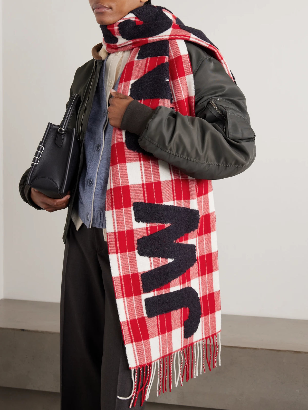 Image of Scarves & Shawls. Product name - Fringed Appliquéd Checked Wool-blend Scarf in Red colour by brand - JW Anderson