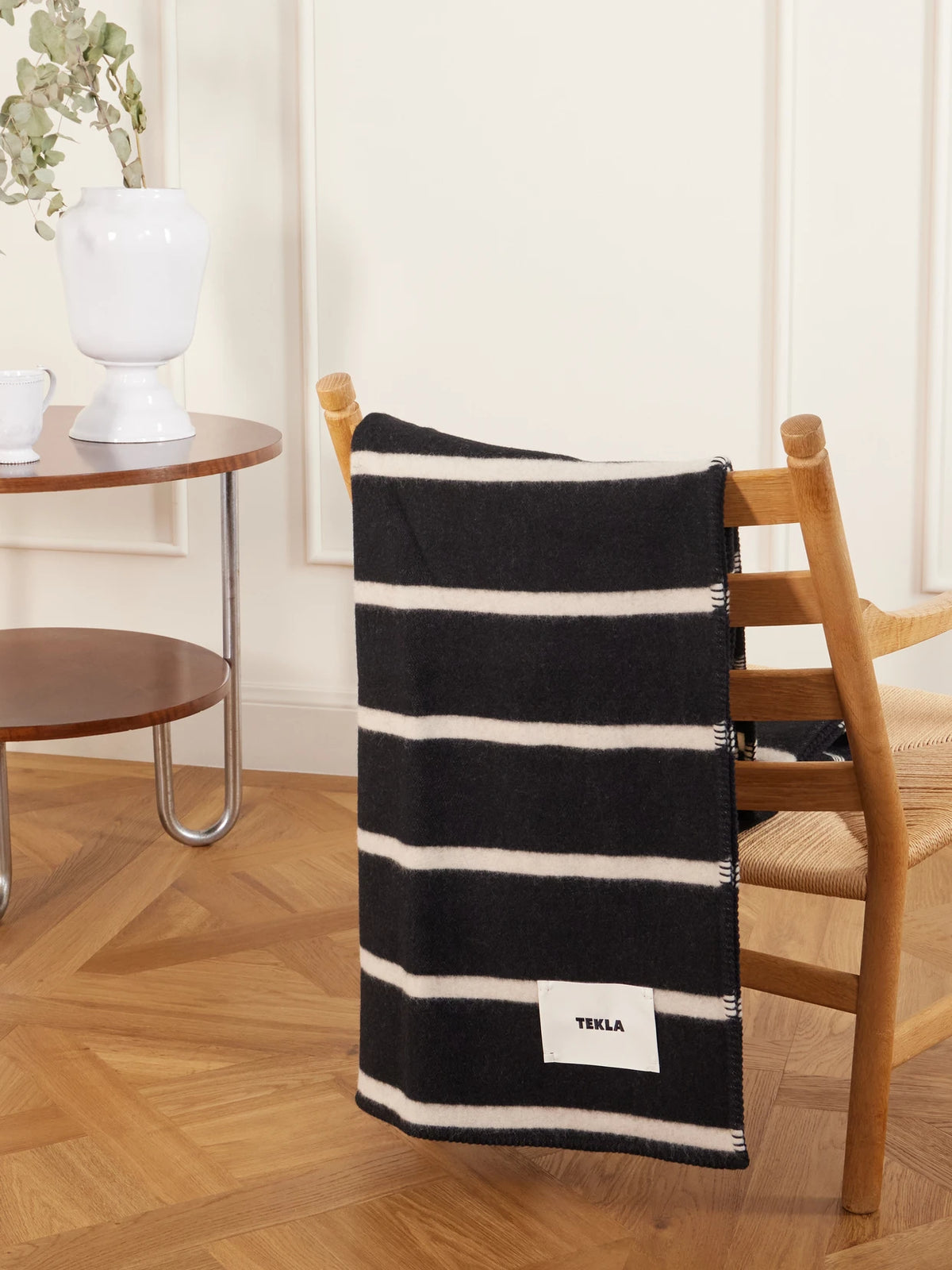 Image of Chair & Sofa Cushions. Product name - Striped Wool Blanket in Black colour by brand - TEKLA
