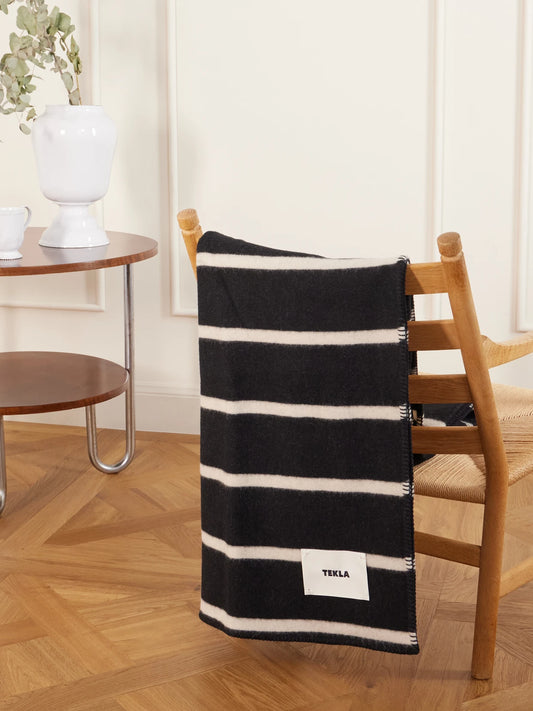 Image of Chair & Sofa Cushions. Product name - Striped Wool Blanket in Black colour by brand - TEKLA
