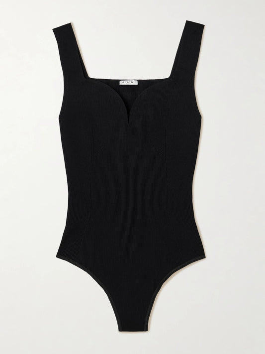 Image of a model wearing Tops. Product name - Ribbed Jersey Bodysuit in Black colour by brand - Alaïa